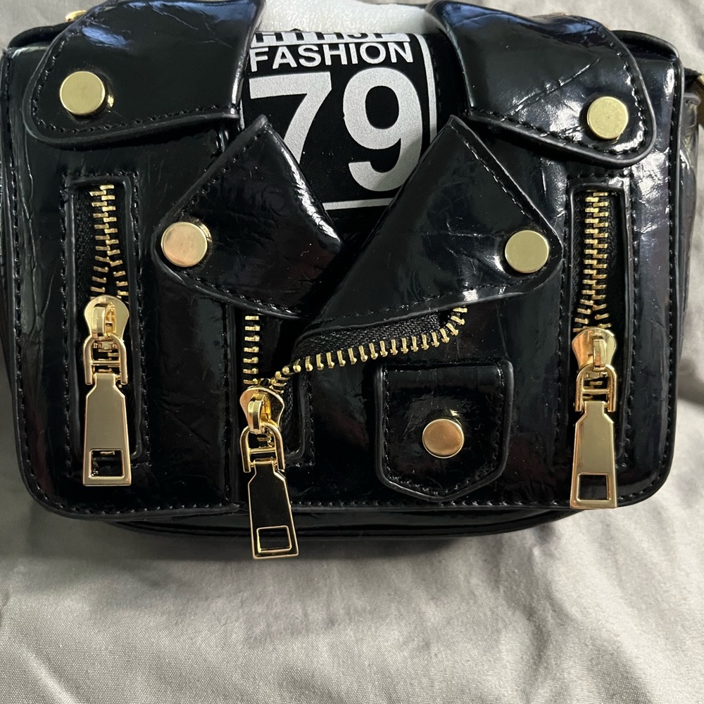 Motorcycle jacket crossbody bag